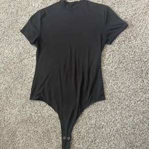 Body suit with high neck